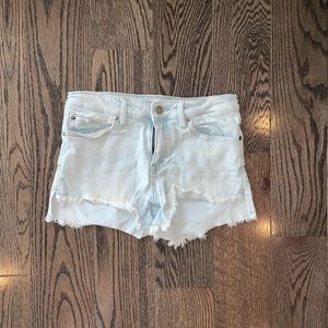 Small, washed jeans, distress on bottom